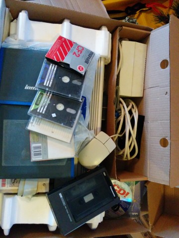 In the inner box we have the PSU, mouse, a Panasonic tape recorder, and some 3" disks